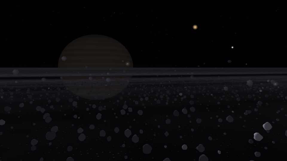 Los anillos en la sombra de Saturno: el planeta apenas visible y el hielo en penumbra
